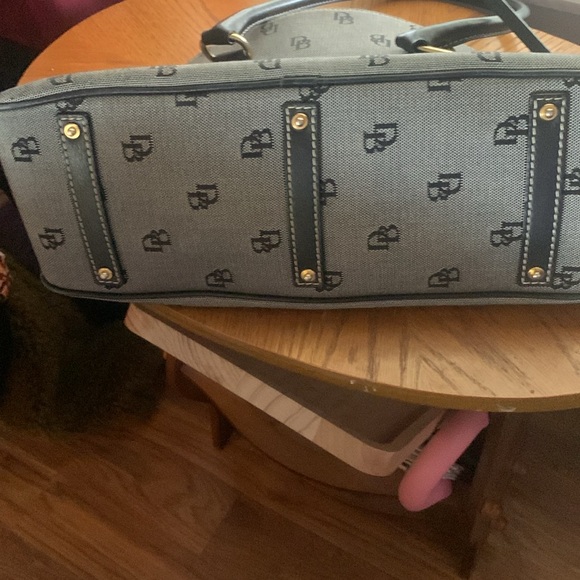 Dooney and Bourke in the classic DB pattern. Navy with pink inside - Picture 5 of 7